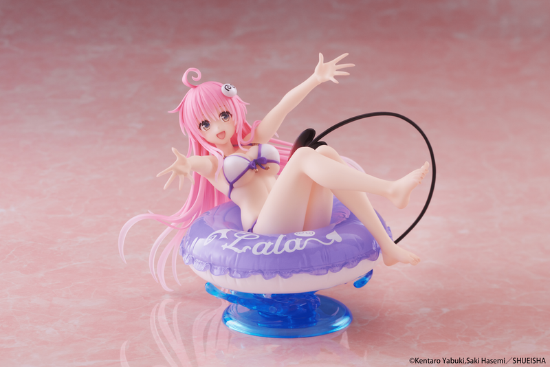 Anime character figurine on a pink background